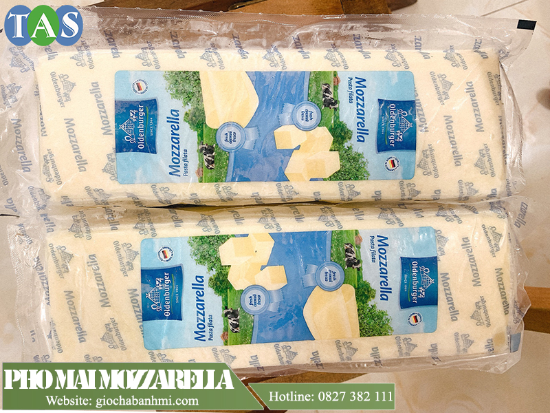 phô mai mozzarella nguyên khối màu vàng lợt phô mai mozzarella nguyên khối màu vàng lợt